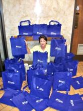 Woman with reusable shopping bags